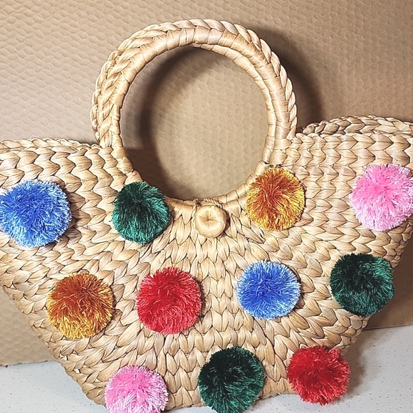 Handbags - Woven, Rattan Bag, Purse  round Handle with Colorful Pom Poms. New. No tags.